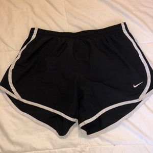 Nike track shorts.